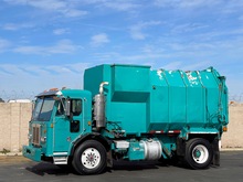2001 Peterbilt 320 Amrep Automated Side Loader Garbage Truck