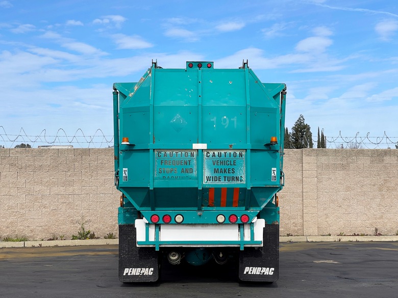 2001 Peterbilt 320 Amrep Automated Side Loader Garbage Truck